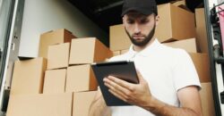 A man holding a clipboard