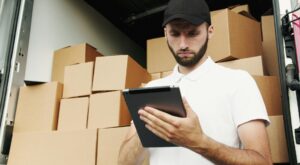 A man holding a clipboard