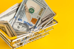money in a shopping cart